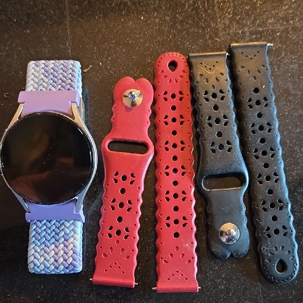 Samsung Smartwatch with Purple and Red Bands